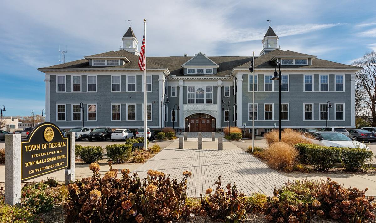 Dedham Town Hall and Senior Center in the Ames Schoolhouse at 450 Washington Street, with the Town of Dedham sign