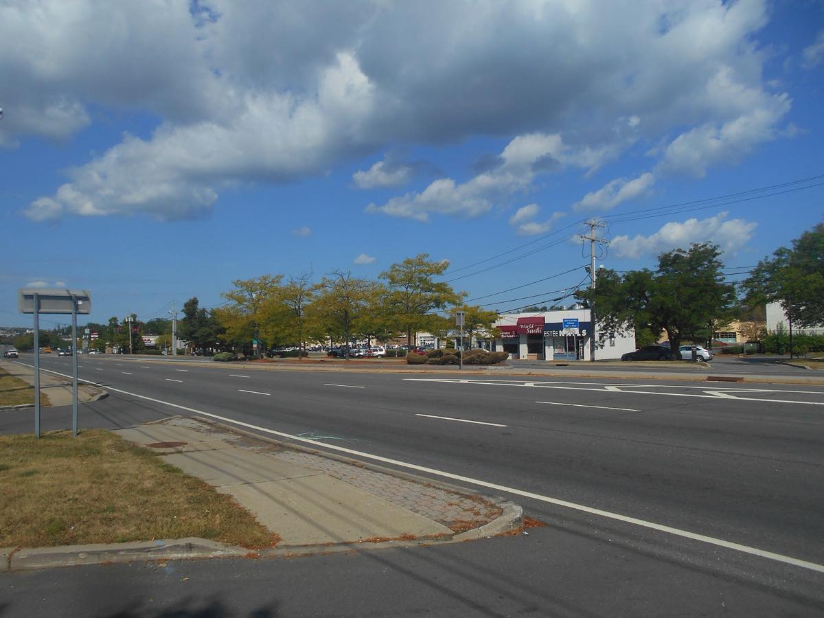 Four-lane Route 59 in Nanuet lined with stores